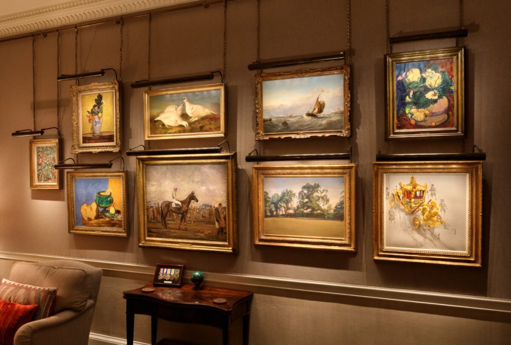 Private Art Collection lit with bespoke ArtView picture lights on hanging rail system