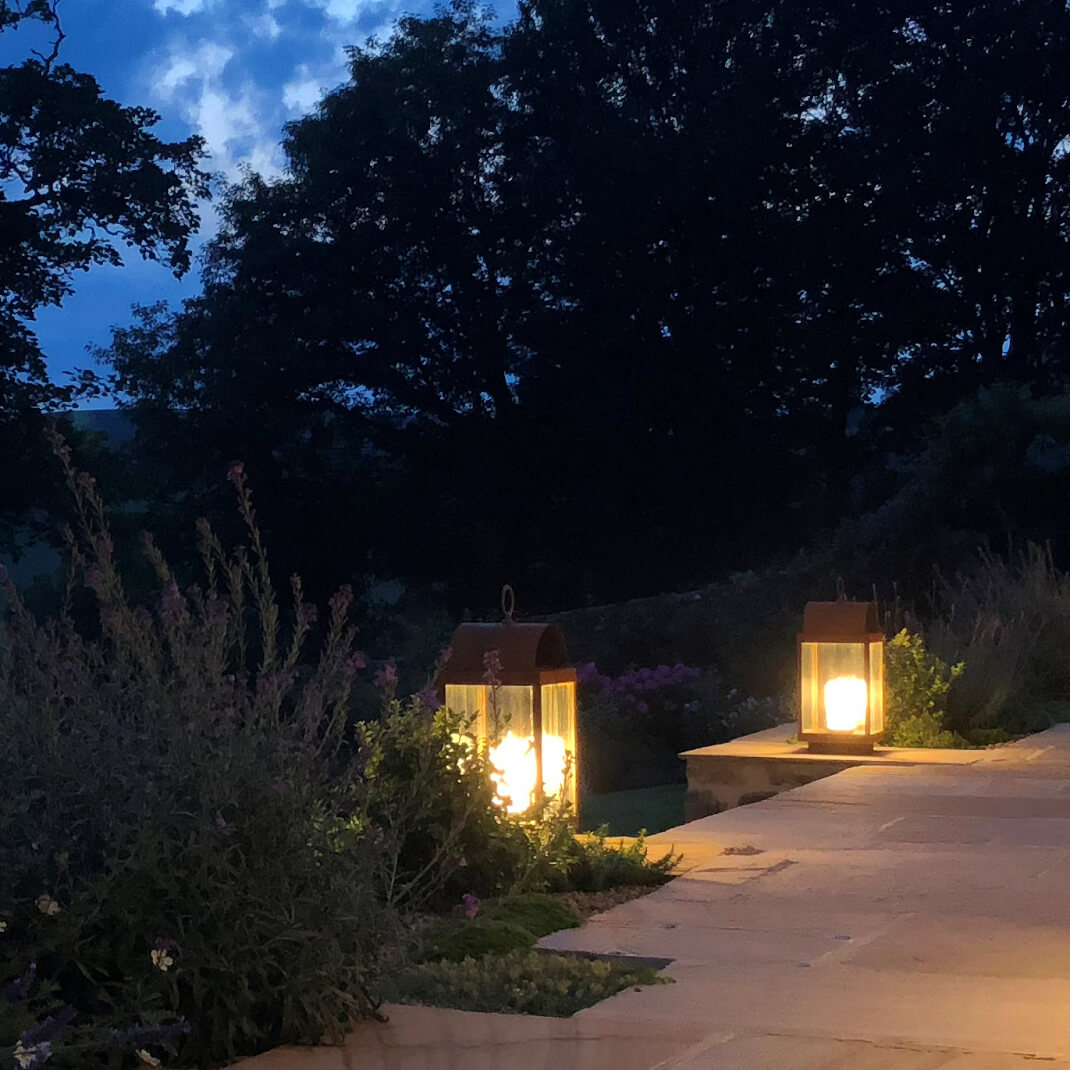 Garden lighting lanterns on a stone pathway